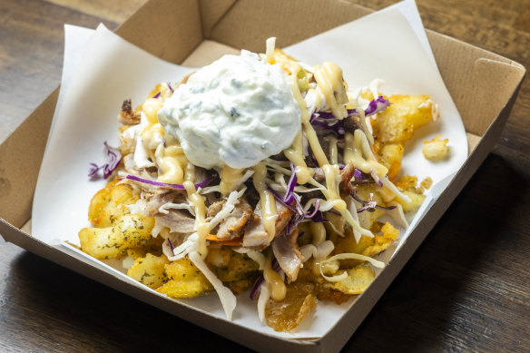 The Secret Spud is loaded with chicken and lamb gyros, coleslaw and tzatziki.