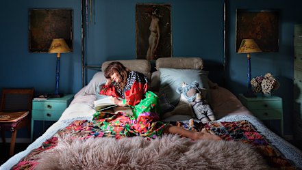 Helena Christensen in her New York bedroom. One of her design philosophies is to “use every corner”, so there is always somewhere to sit and read. 