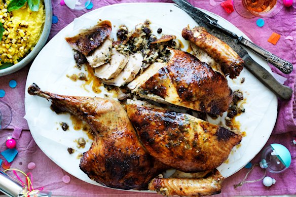 Butterflied roast turkey with chestnut, herb and bread stuffing.