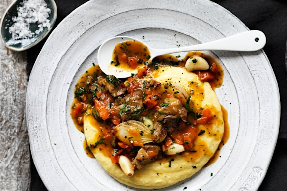 Braised lamb necks, pearl onions and garlic.