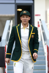 Tim Paine walks out for the coin toss in his Captain’s Blazer during day one of the First Test match in the series between Australia and Pakistan in 2018.