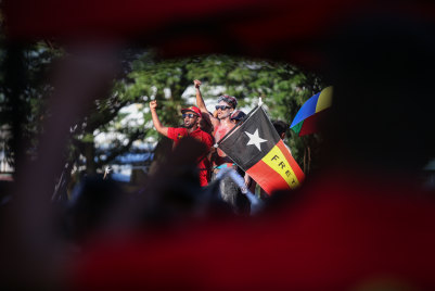 Fretilin supporters attend a pre-poll rally.