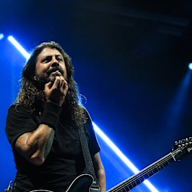 A chin-scratcher: Dave Grohl, seen here on stage in Brisbane, is rumoured to be one of the invited guests.