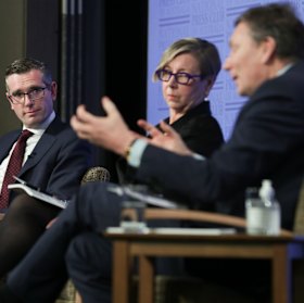 NSW Treasurer Dominic Perrottet with review panel members Jane Halton and David Thodey at the launch of the plan at the National Press Club in Canberra on Wednesday.