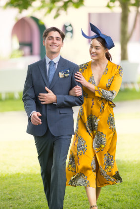Lucy wears Whistles dress and Olga Berg headpiece; Charlie wears Aquila suit. All available from Myer. 
