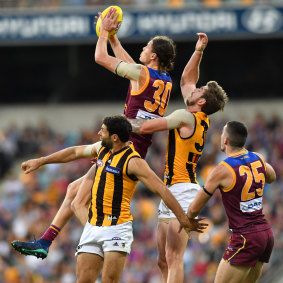 Got it: Brisbane's young gun Eric Hipwood takes a strong mark during the Lions upset win over Hawthorn at the Gabba.