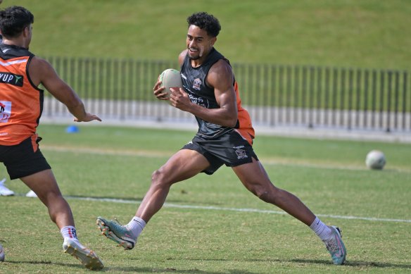 What second-year syndrome? Jahream Bula stretches out at Wests Tigers training on Thursday.