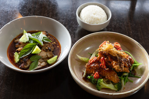 The turmeric and lemongrass chicken and the crispy-skin barramundi at 102UNIQ in Collingwood.