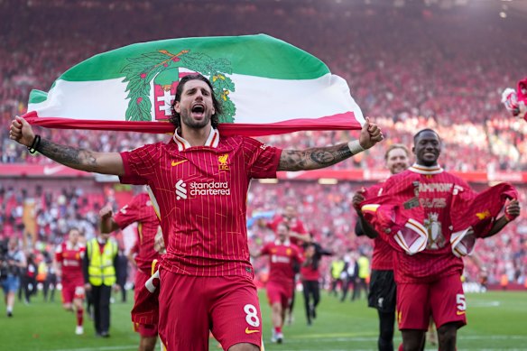 Liverpool’s Dominik Szoboszlai celebrates with teammates.
