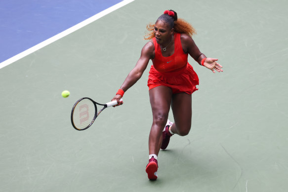 Serena Williams hits a return in her quarter-final against  Tsvetana Pironkova. 