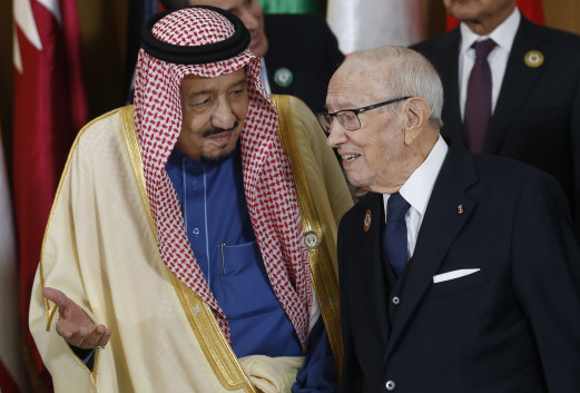 Saudi Arabia's King Salman bin Abdulaziz, left, speaks with Tunisian President Beji Caid Essebsi ahead of the 30th Arab Summit in Tunis, Tunisia, Sunday, March 31, 2019. 