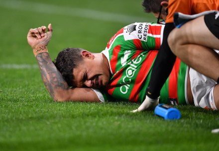 Rabbitohs fullback Latrell Mitchell goes down injured on Thursday night.