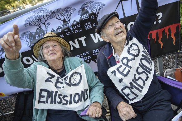 Pat and John Darby were among the activists protesting Woodside on Thursday.