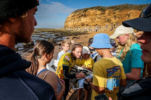 Popular with the punters: Caity Simmers greets the fans on day one of the Bells Beach Pro.