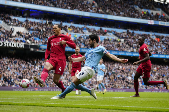 Ilkay Gundogan scores for Manchester City in their game against Liverpool on Saturday.