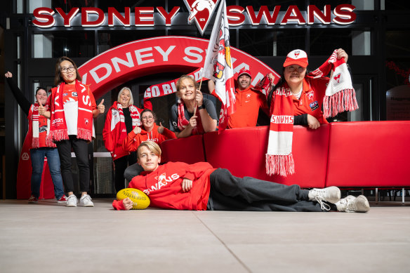 The Sydney Swans cheer squad (including Liz Whiffin centre holding the flag) gather ahead of Saturday’s game against Fremantle