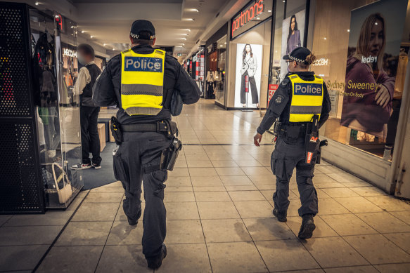 Officers from Operation Alliance – Victoria Police’s young gang taskforce – patrol a Melbourne shopping centre