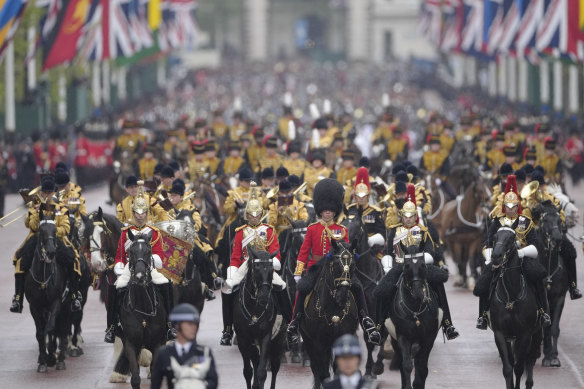 The procession on the way to Buckingham Palace after coronation ceremony for Britain’s King Charles III and Queen Camilla in London.