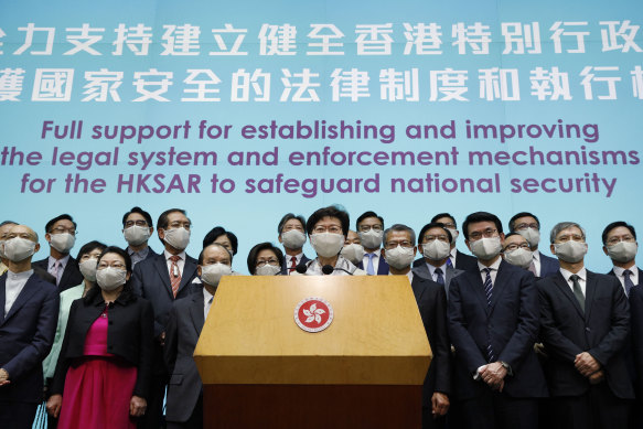 Hong Kong Chief Executive Carrie Lam, centre, and other officials doubled down at a press conference in Hong Kong after returning from China's National People's Congress (NPC) meeting in Beijing.