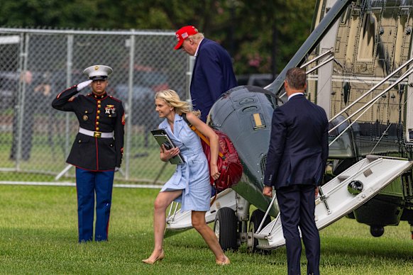 Natalie Harp this week disembarking Marine One with President Donald Trump following a weekend in New Jersey at his golf club.