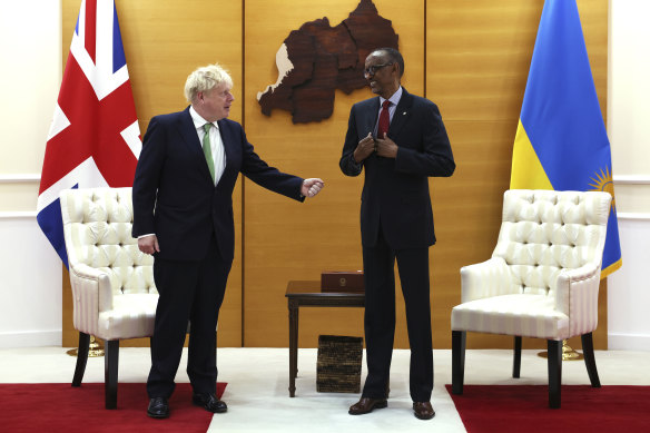 British Prime Minister Boris Johnson (left) meets with Rwandan President Paul Kagame during a bilateral meeting in Rwanda.