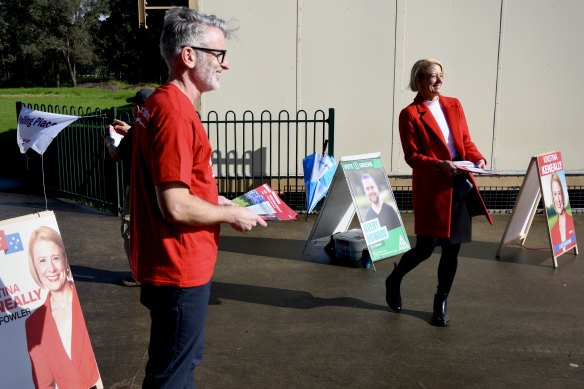 Kristina Keneally hands out how-to-vote cards at Harrington Street Public School in Cabramatta, Sydney on Saturday.