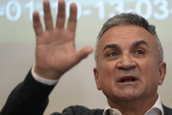 Novak Djokovic’s father Srdjan speaks at a press conference in Belgrade, Serbia.