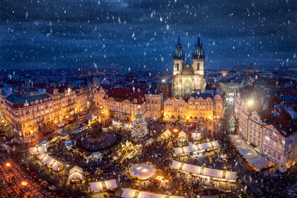 Prague and its old town square with its Christmas market. 