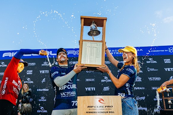 Celebration time: Jack Robinson and Isabella Nichols after their success at Bells Beach.