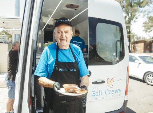 Man in the van: Rev Bill Crews Foundation food van volunteer Brian White serving up free breakfast to those in need at the Lethbridge Park Community Centre, December 7.