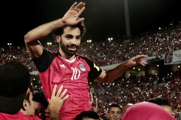 Egypt's Mohamed Salah celebrates defeating Congo in a World Cup qualifier.