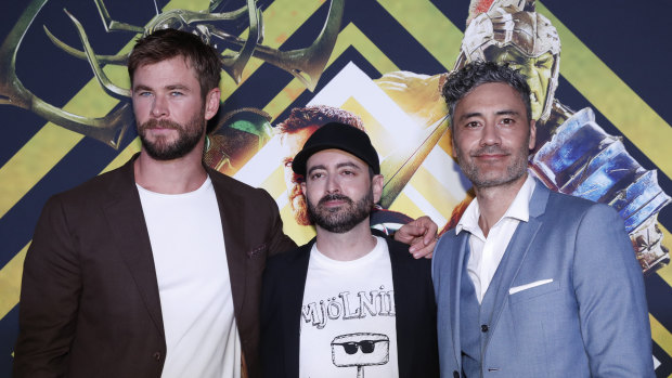 Hemsworth with producer Brad Winderbaum (centre) and director Taika Waititi at the Gold Coast premiere.