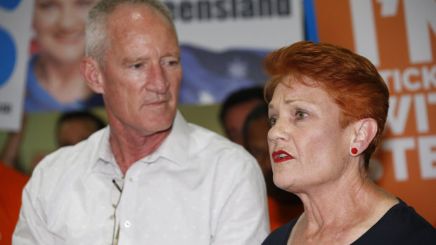One Nation leader and senator Pauline Hanson flanked by state leader Steve Dickson.