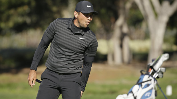 Jason Day reacts after missing an eagle putt at Pebble Beach.