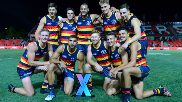 The Crows enjoy their night's work in Adelaide.