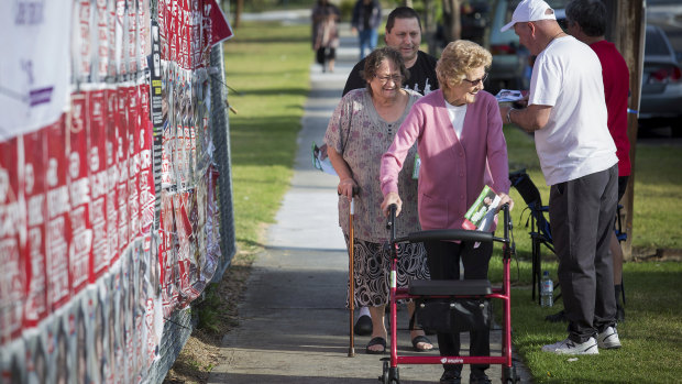 Voters head to East Reservoir Senior Citizens Centre to vote in the Batman byelection.