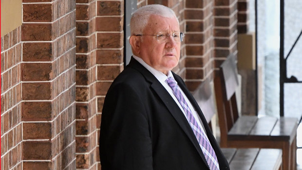 Ron Medich leaves his Supreme Court murder trial on Tuesday.
