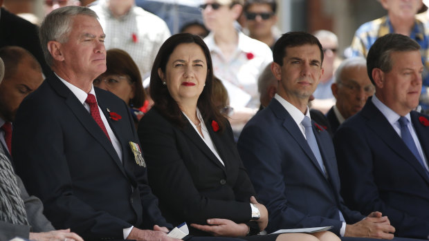 Queensland Premier Annastacia Palaszczuk and Opposition Leader Tim Nicholls, along with other dignitaries, attend the Remembrance Day ceremony in Brisbane on Saturday.