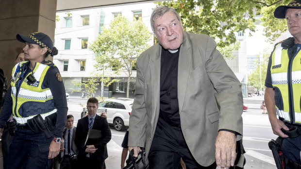 Cardinal George Pell arrives at court on Tuesday.