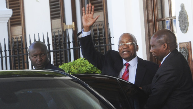 "He's a desperate man at the moment": South African President Jacob Zuma (centre).