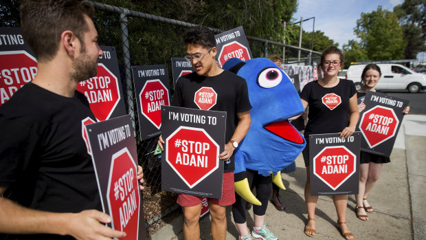 Stop Adani campaigners and their mascot 'Dory' at the Preston West Primary School polling station.