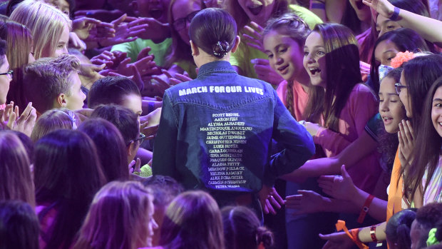 Kids' Choice winner Millie Bobby Brown wore a shirt bearing the names of Parkland shooting victims.
