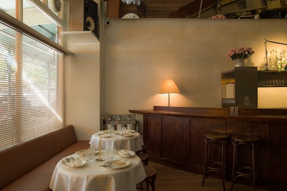 Owner-chef Audrey Shaw has added a slanted ceiling mirrors “for people watching” but the bar remains.