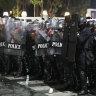 Thai police clash with protesters near king’s palace