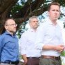 Federal Greens leader Adam Bandt, state MP for Maiwar, Michael Berkman, and federal MP for Griffith, Max Chandler-Mather, at a press conference in New Farm.