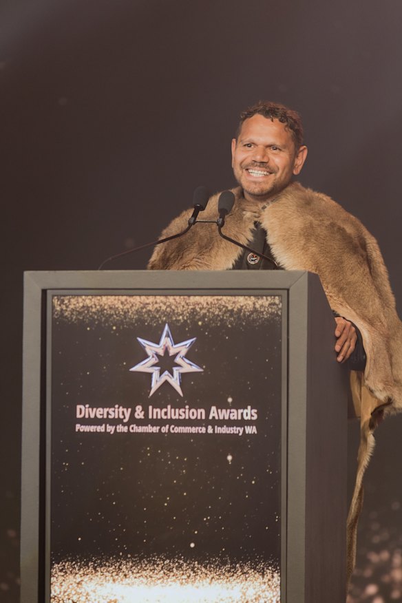 Jon Ford on stage for the Welcome to Country.