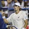 Alex de Minaur celebrates winning through to the final in Washington.