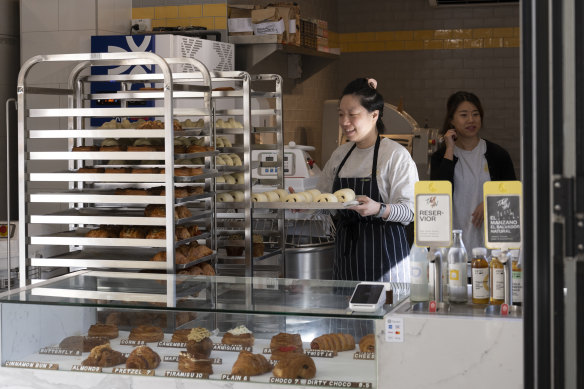 A new batch of croissants arrives on the proving racks at Crescent Croissanterie.