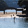 Beachgoers enjoy the winter sun at Balmoral.