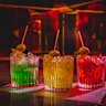 The signature green, yellow and red negronis.